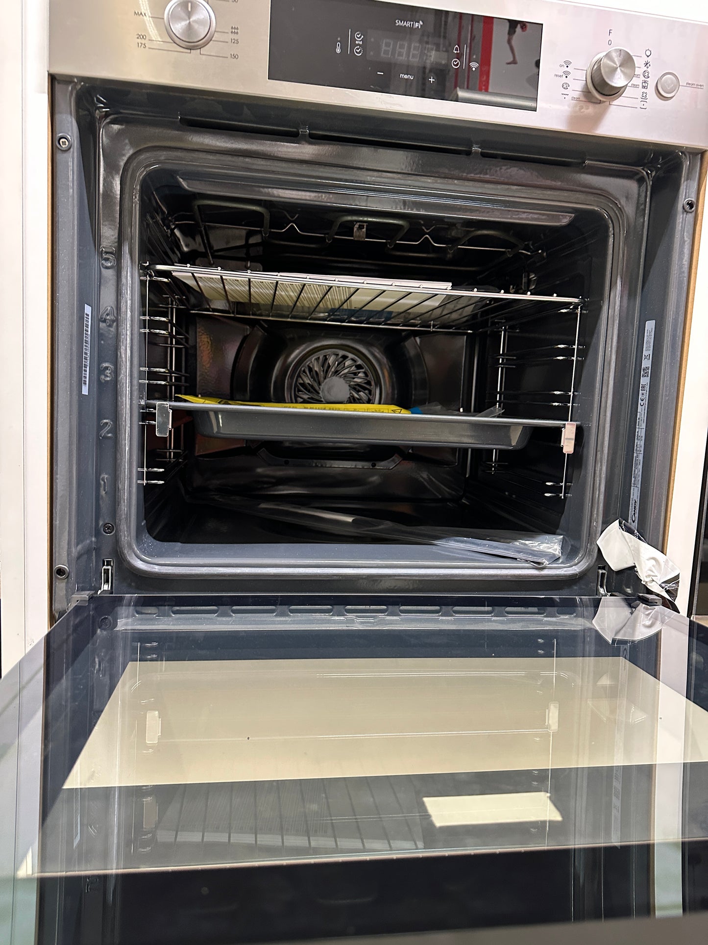Horno Auto limpiante con Vapor + Microondas empotrable Candy