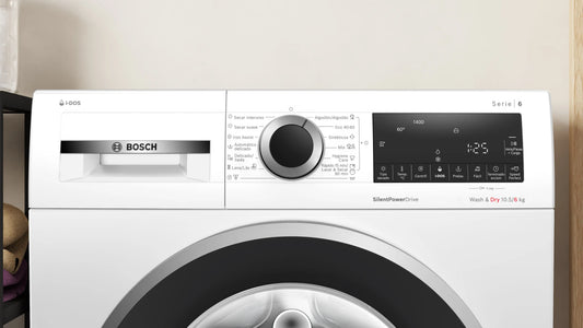 Lavasecarropas Bosch WNG244A0ES con puerta abierta mostrando tambor de gran capacidad