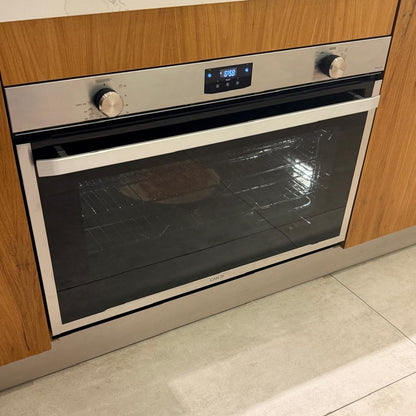 Horno eléctrico Italiano Candy 90 cm ELIOE91MF-12 foto de frente cocinando