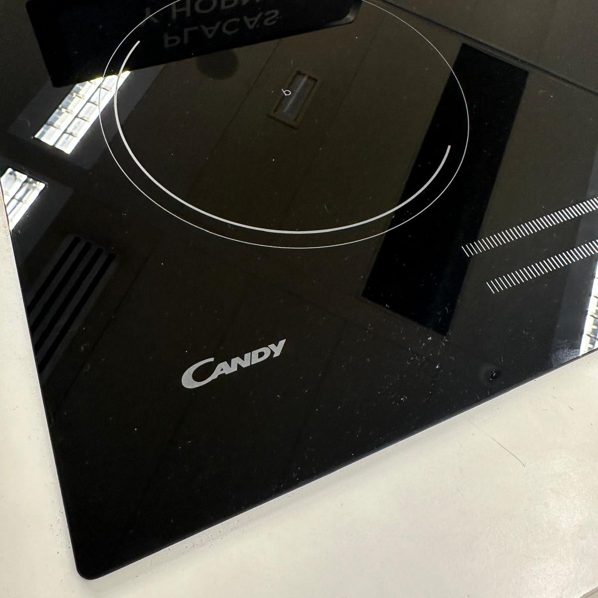 Anafe vitrocerámico Candy negro con 4 zonas de cocción y panel táctil