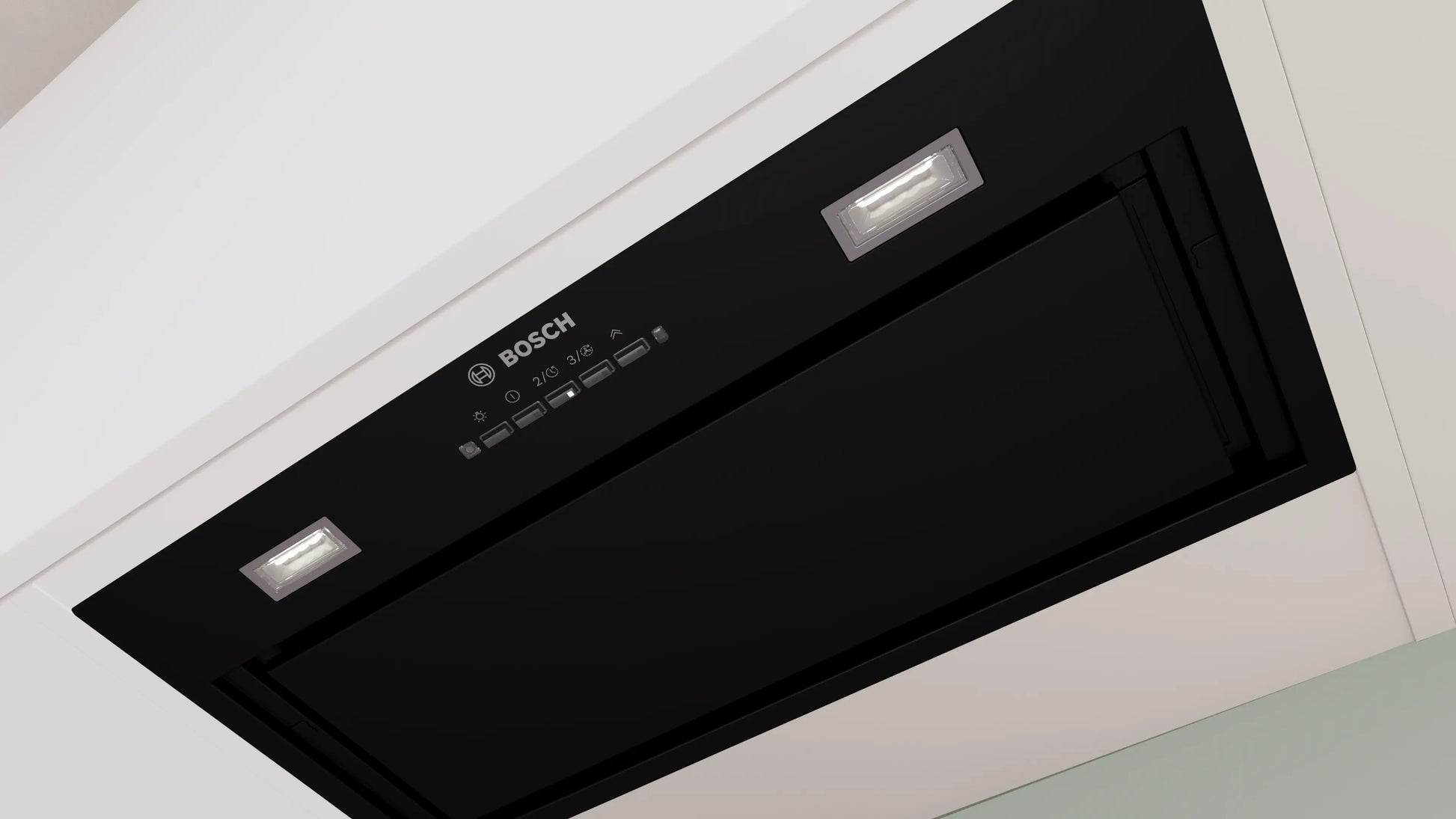 Vista en perspectiva de la campana Bosch DLN57PC60 con filtros antigrasa