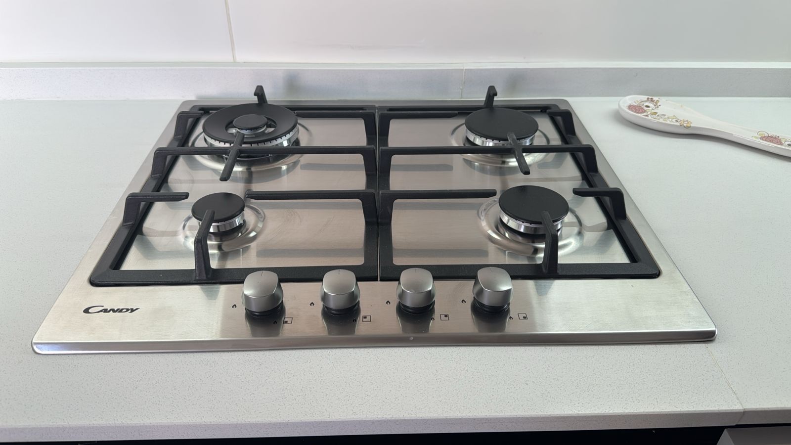 Horno empotrable Candy con anafe a gas integrado color acero inoxidable