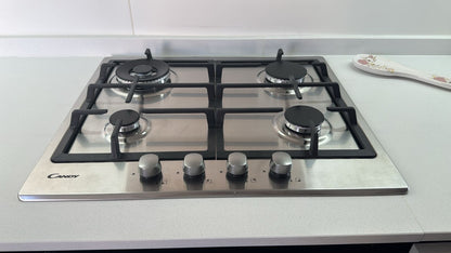 Horno empotrable Candy con anafe a gas integrado color acero inoxidable