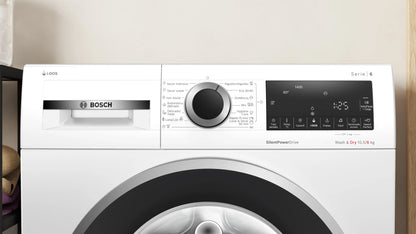 Lavasecarropas Bosch WNG244A0ES con puerta abierta mostrando tambor de gran capacidad
